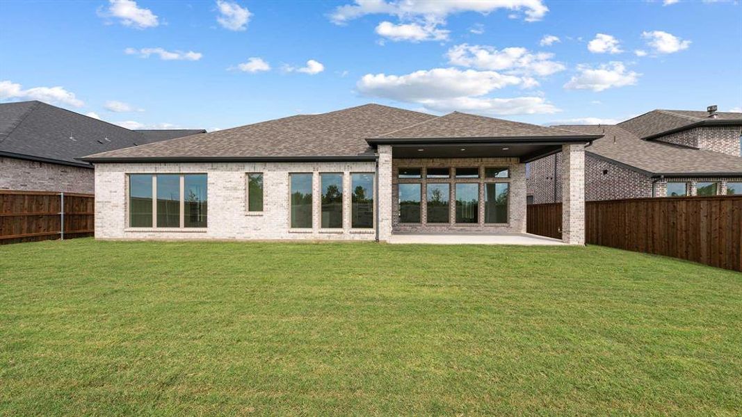 Exterior details and patio area of a home in Trinity Falls 60', McKinney (Image 3). Exterior details and patio area of a home in Trinity Falls 60', McKinney (Image 3).