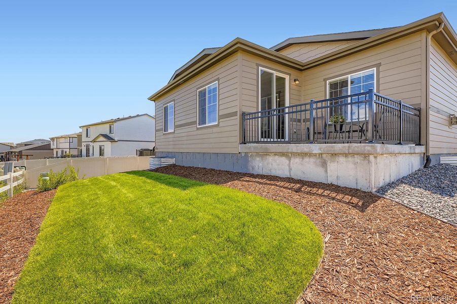 Front exterior of a new home in Single Family Homes at Anthology North, Parker, CO, highlighting curb appeal (Image 19). Front exterior of a new home in Single Family Homes at Anthology North, Parker, CO, highlighting curb appeal (Image 19).