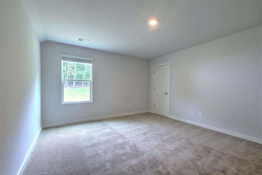 Spacious, unfurnished interior of a new home in The Woodlands Preserve, Jackson (Image 24).