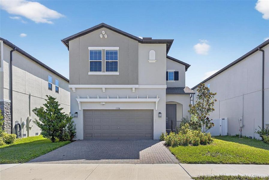 Front exterior of a new home in , Tampa, FL, highlighting curb appeal (Image 2).