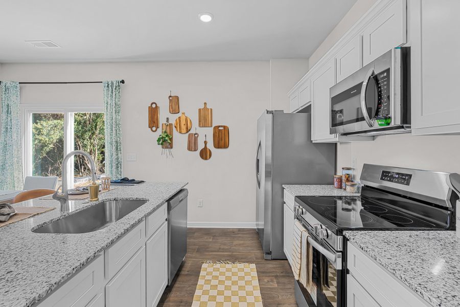 Representative furnished interior of a home built from the Oak by McGuinn Homes in Faith Hill, West Columbia (Image 14).