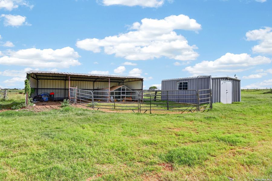 Exterior details and patio area of a home in , Floresville (Image 13).