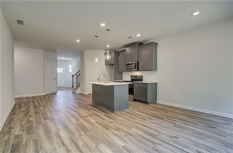 Furnished interior view inside a new home in Enclave at Evergreen, Fairburn (Image 9).