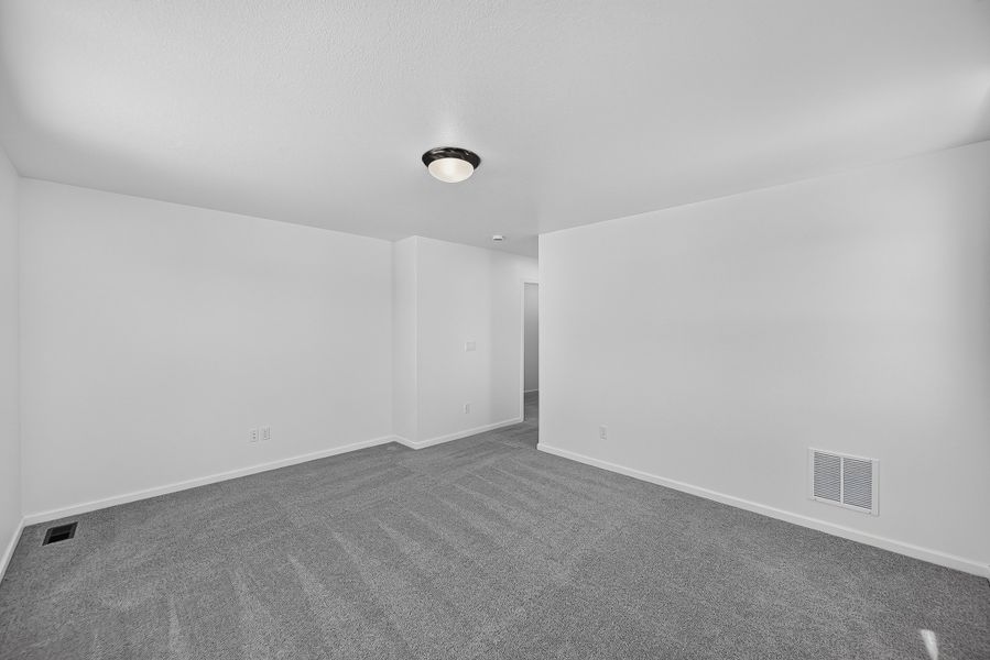 Spacious, unfurnished interior of a new home in Sky Ranch, Watkins (Image 18). Spacious, unfurnished interior of a new home in Sky Ranch, Watkins (Image 18).
