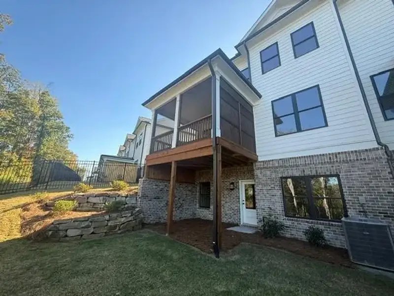 Exterior details and patio area of a home in Millcroft, Buford (Image 25).