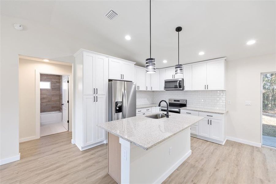 Furnished interior view inside a new home in , Dunnellon (Image 5).