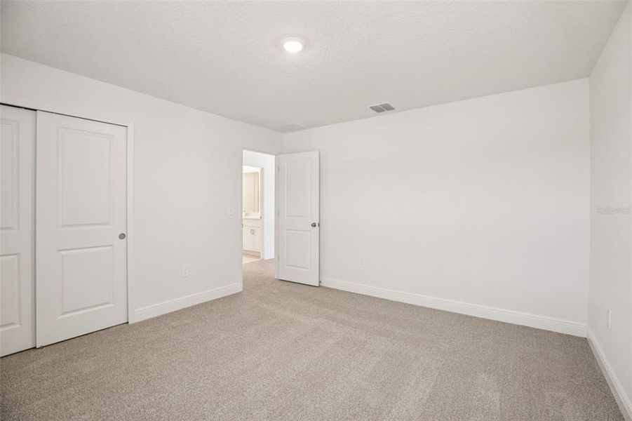 Spacious, unfurnished interior of a new home in The Reserve at Hammock Oaks - Classic Series, Lady Lake (Image 38).