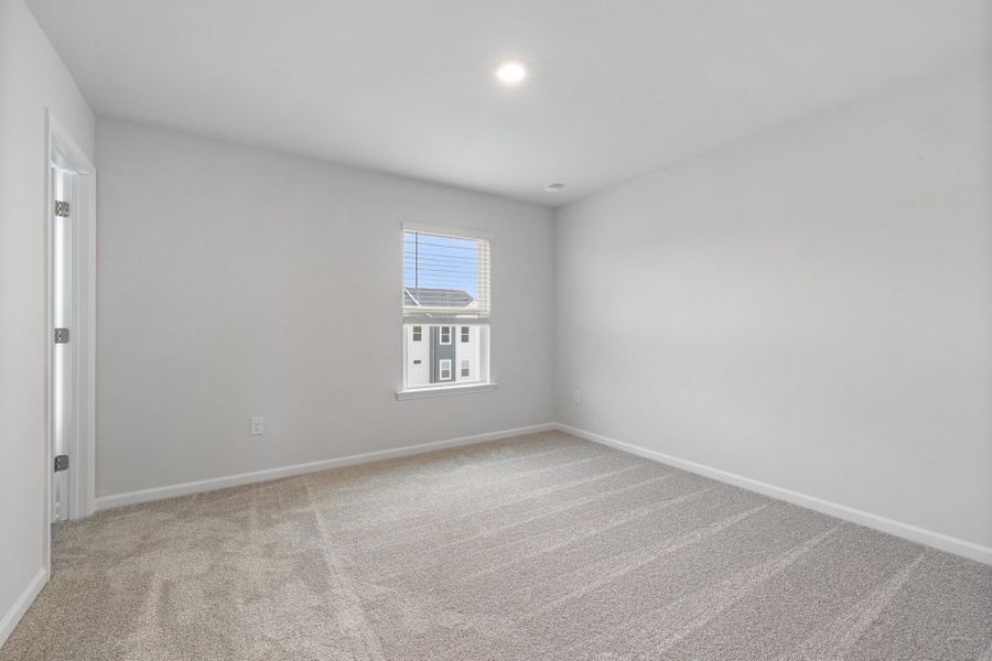 Spacious, unfurnished interior of a new home in Everton, Durham (Image 43).