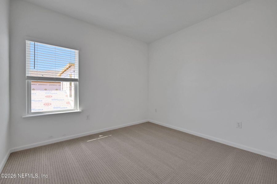 Spacious, unfurnished interior of a new home in TrailMark, St. Augustine (Image 15).