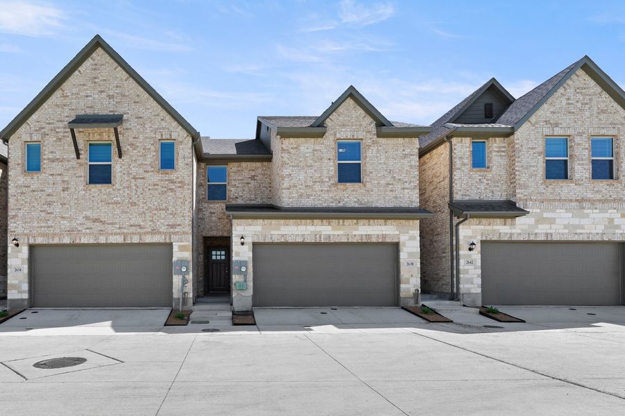 Front exterior of a new home in Sereno Oaks, Dallas, TX, highlighting curb appeal (Image 1). Front exterior of a new home in Sereno Oaks, Dallas, TX, highlighting curb appeal (Image 1).