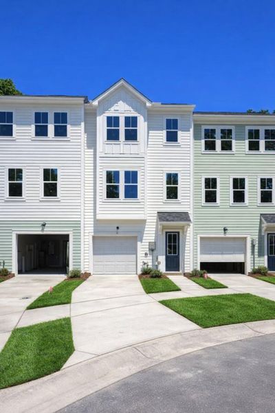 Front exterior of a new home in , Johns Island, SC, highlighting curb appeal (Image 1). Front exterior of a new home in , Johns Island, SC, highlighting curb appeal (Image 1).