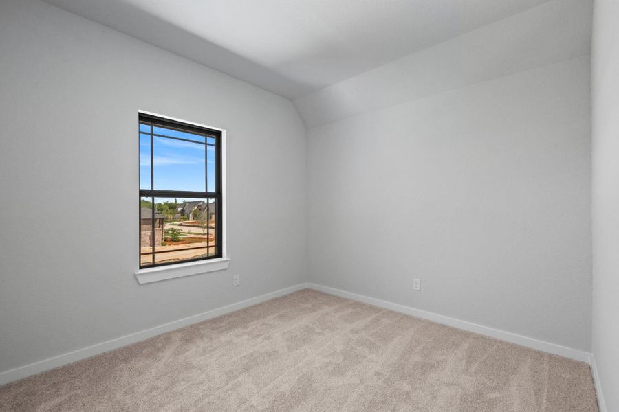 Large secondary bedroom upstairs with tons of natural light. Large secondary bedroom upstairs with tons of natural light.