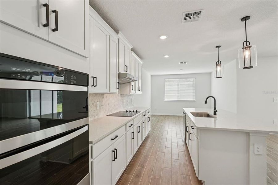 Furnished interior view inside a new home in Oakfield Trails - Signature Series, Parrish (Image 6).