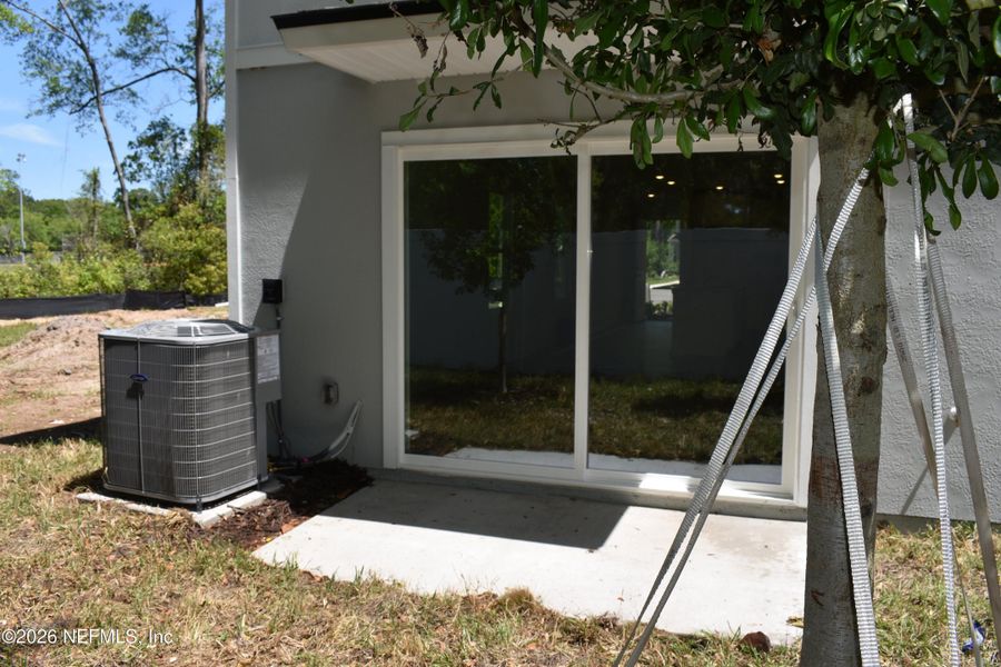 Exterior details and patio area of a home in Irongate Villas, Jacksonville (Image 2).