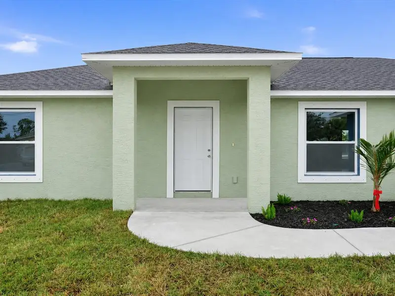 Exterior details and patio area of a home in , Port Charlotte (Image 1). Exterior details and patio area of a home in , Port Charlotte (Image 1).