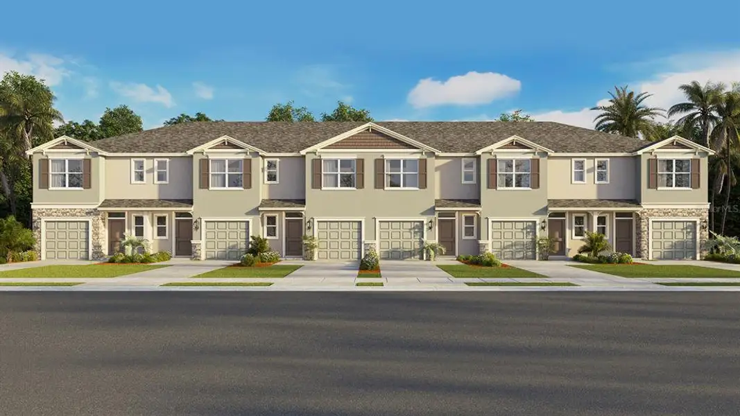 Front exterior of a new home in Woodcreek, Wesley Chapel, FL, highlighting curb appeal (Image 1).