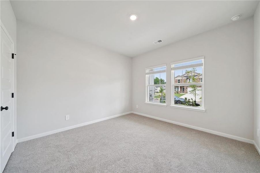 Spacious, unfurnished interior of a new home in Vines at Mill Creek - Estate Series, Braselton (Image 32).
