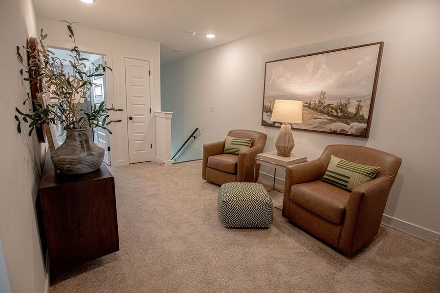 Representative furnished interior of a home built from the Provost by Grant & Co in The Townhomes at Union Depot, Bartlett (Image 28).