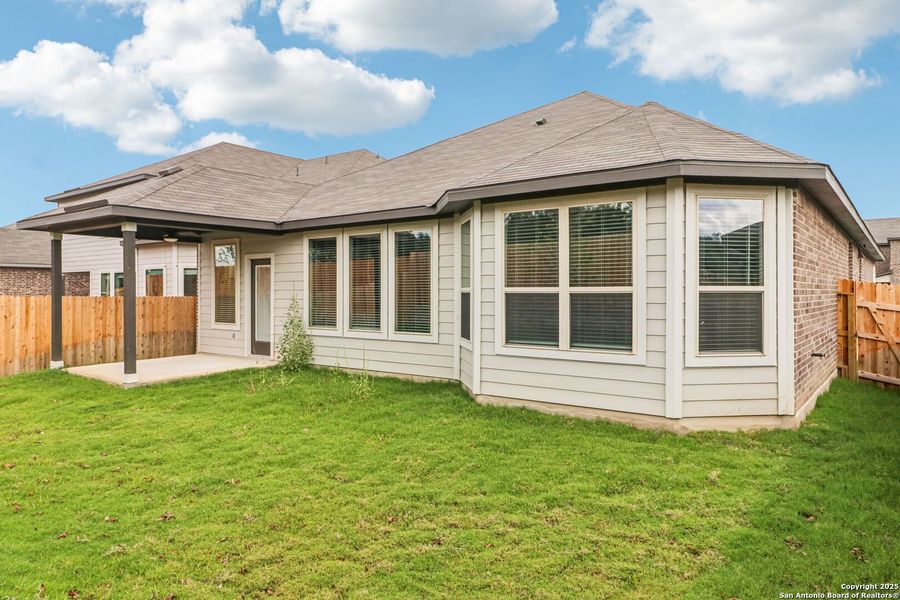 Exterior details and patio area of a home in Fox Falls, Boerne (Image 19).