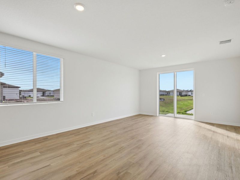 Spacious, unfurnished interior of a new home in The Grove at Stuart Crossing - Premier Series, Bartow (Image 9). Spacious, unfurnished interior of a new home in The Grove at Stuart Crossing - Premier Series, Bartow (Image 9).