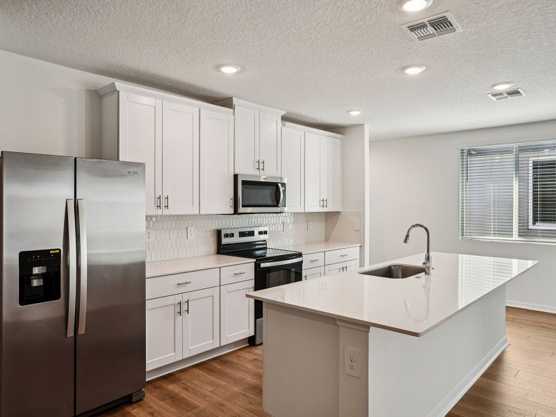 Furnished interior view inside a new home in Ridgehaven - Villas, Ormond Beach (Image 3). Furnished interior view inside a new home in Ridgehaven - Villas, Ormond Beach (Image 3).