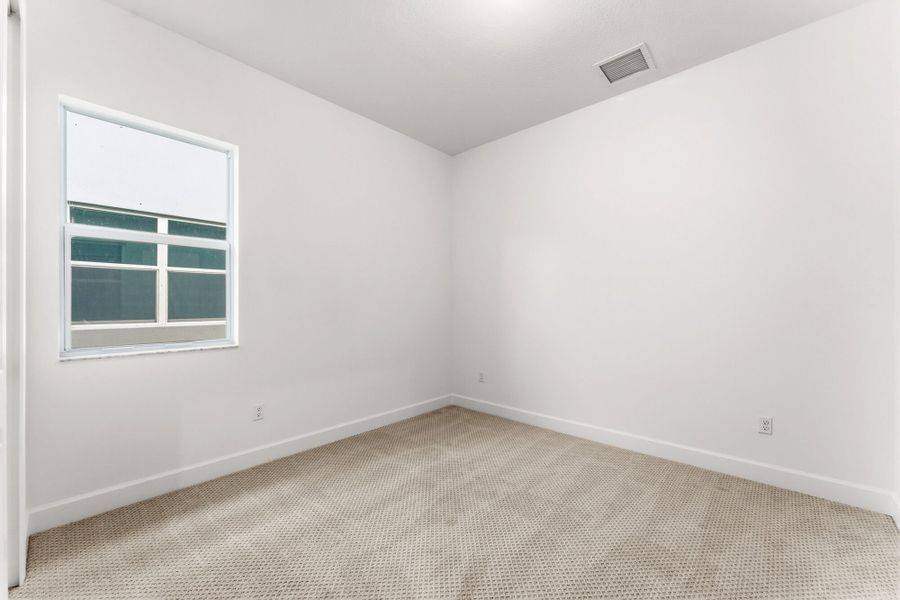 Spacious, unfurnished interior of a new home in Tradition, Port St. Lucie (Image 12).