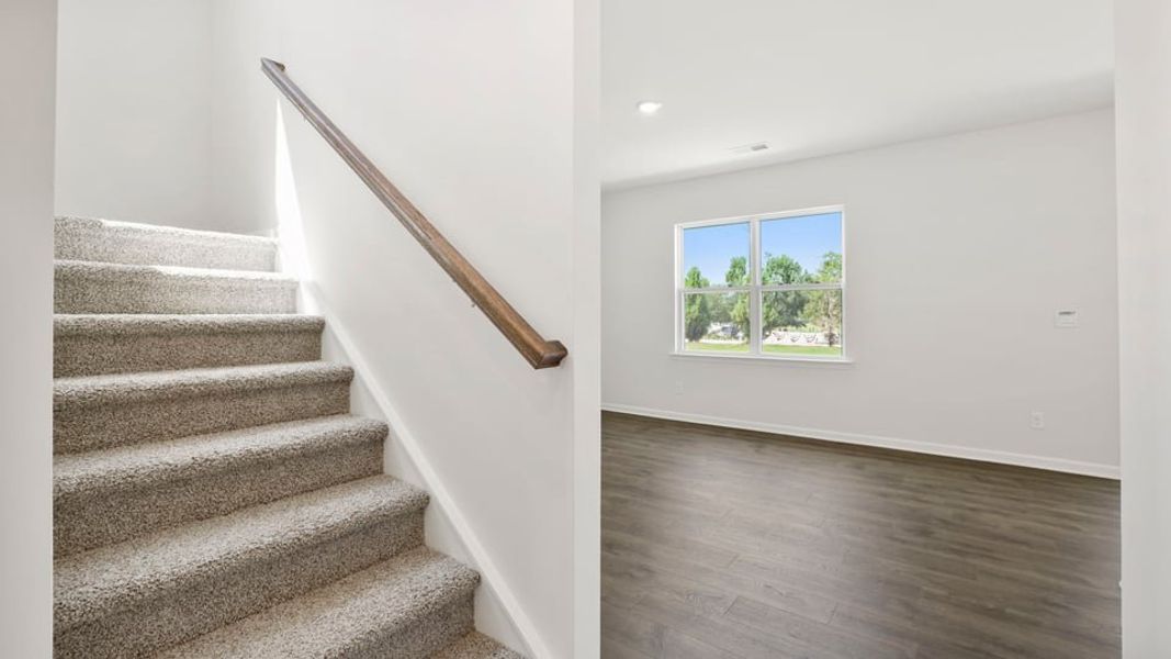 Spacious, unfurnished interior of a new home in Durbin Meadows Traditions, Fountain Inn (Image 26).