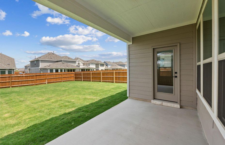 Exterior details and patio area of a home in Santa Rita Ranch, Liberty Hill (Image 21).