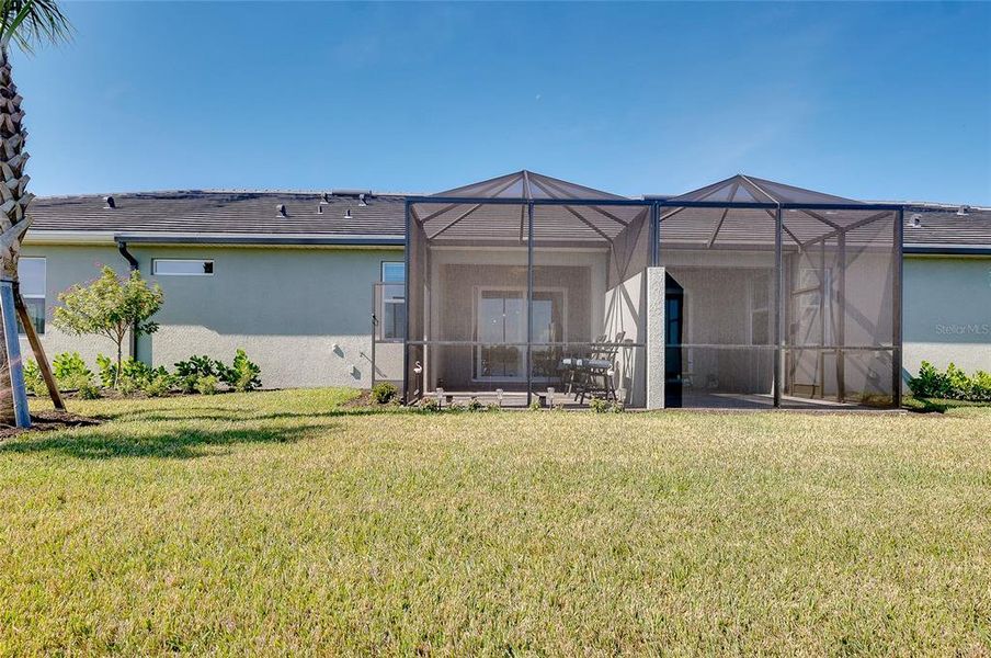 Exterior details and patio area of a home in BeachWalk by Manasota Key, Englewood (Image 26). Exterior details and patio area of a home in BeachWalk by Manasota Key, Englewood (Image 26).