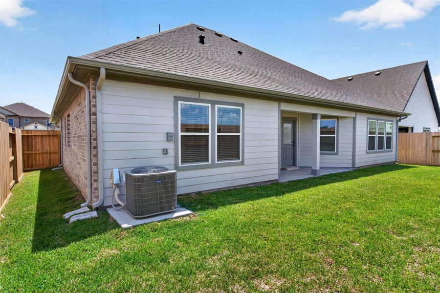 Exterior details and patio area of a home in , Alvin (Image 26).