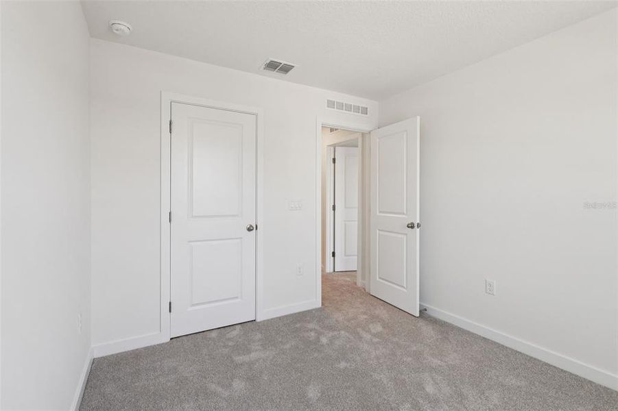 Spacious, unfurnished interior of a new home in Cyrene at Harmony, St. Cloud (Image 31).