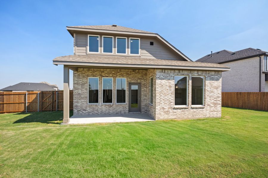 Exterior details and patio area of a home in Elevon, Lavon (Image 3).
