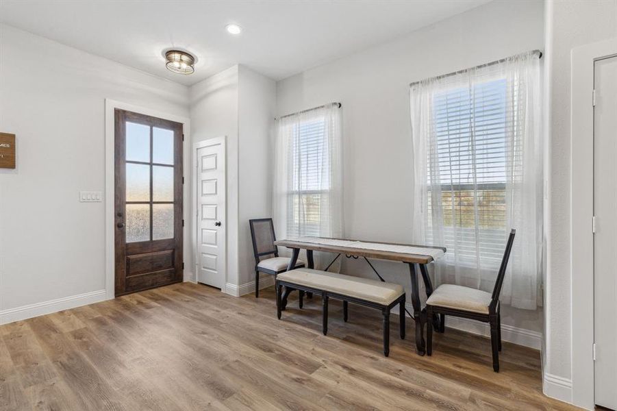 Entrance foyer featuring hardwood / wood-style flooring