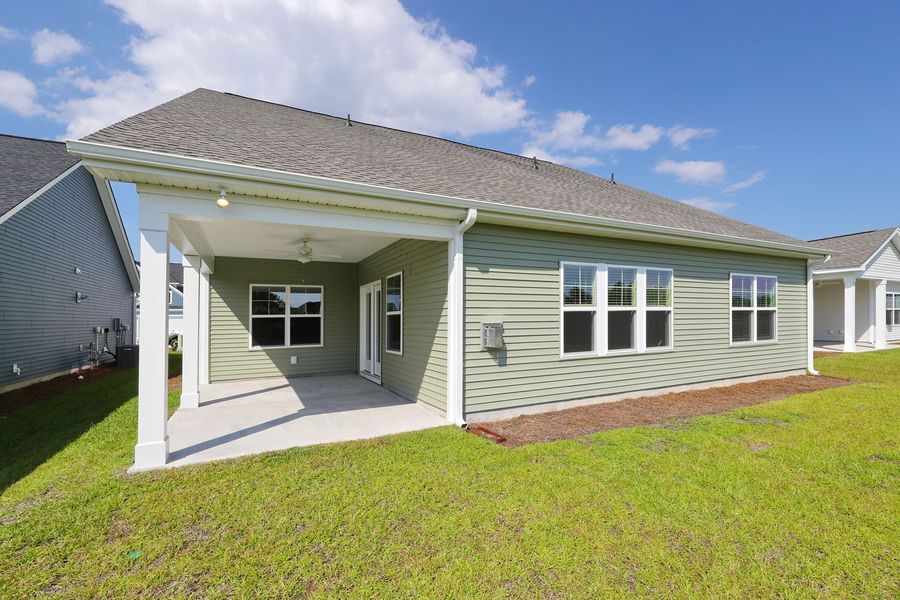 Exterior details and patio area of a home in Arcadia, Myrtle Beach (Image 3).