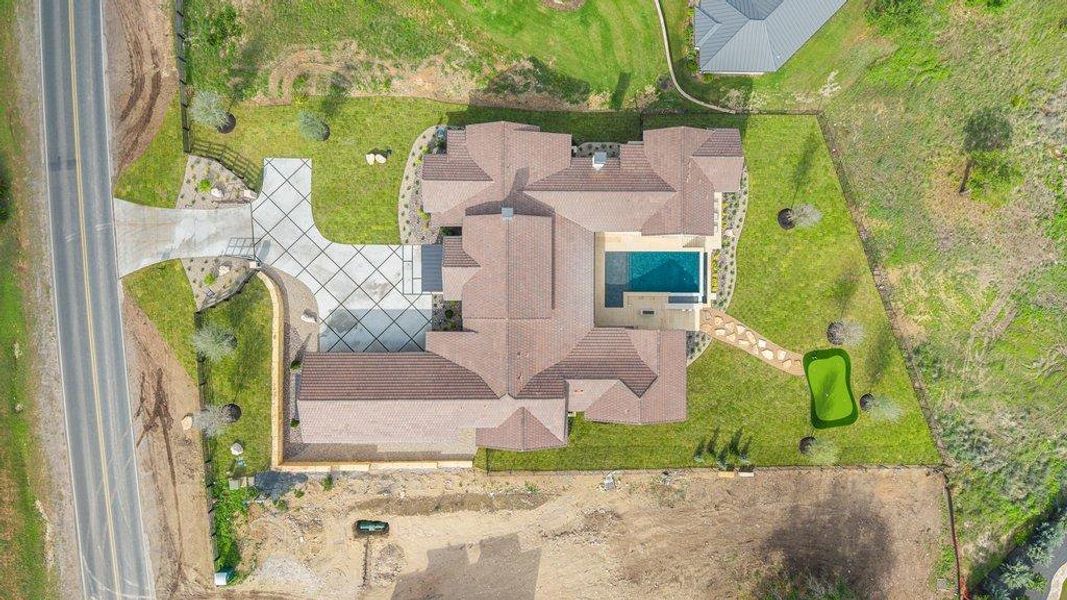 Exterior details and patio area of a home in , Spicewood (Image 22).