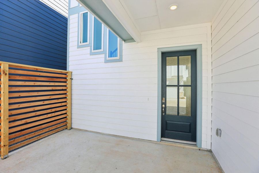 Exterior details and patio area of a home in Kemah Crossing - Luxe Series, Kemah (Image 4). Exterior details and patio area of a home in Kemah Crossing - Luxe Series, Kemah (Image 4).