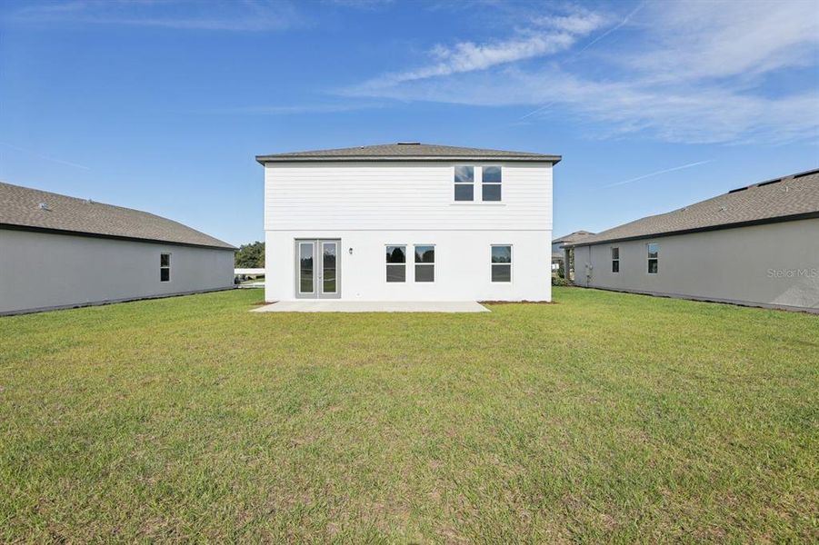 Exterior details and patio area of a home in Tyson Reserve, St. Cloud (Image 4).