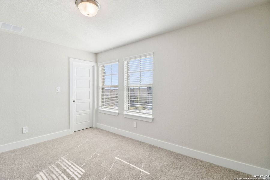 Spacious, unfurnished interior of a new home in Legendary Trails - Premier Series, Cibolo (Image 16).