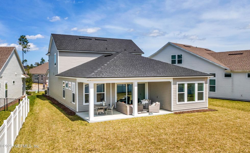 Exterior details and patio area of a home in Courtney Chase, St. Augustine (Image 3). Exterior details and patio area of a home in Courtney Chase, St. Augustine (Image 3).