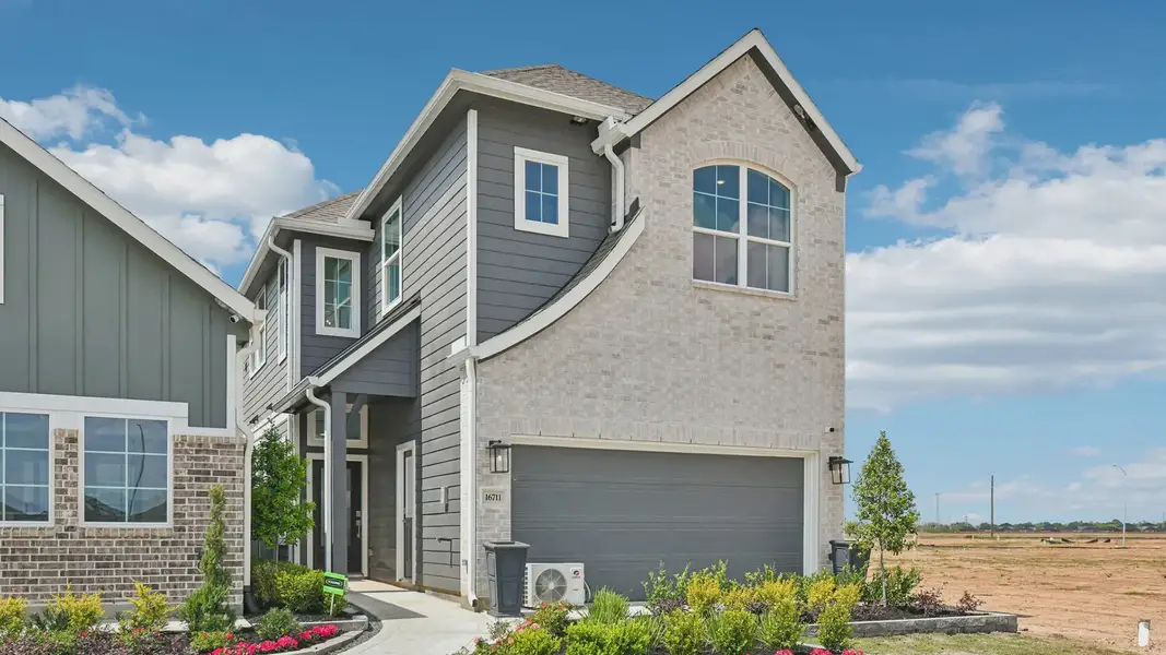 Representative exterior photo of a completed home built from the Versailles by Chesmar Homes in Jubilee Chateau, Hockley, TX (Image 2). Representative exterior photo of a completed home built from the Versailles by Chesmar Homes in Jubilee Chateau, Hockley, TX (Image 2).