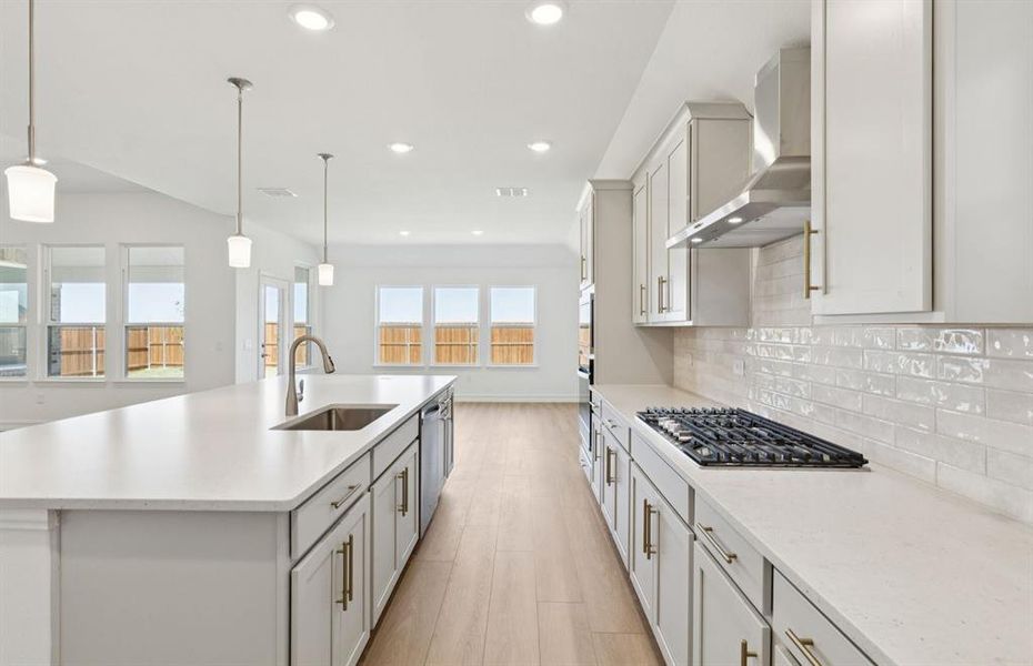 Spacious kitchen with eat-in bartop island Spacious kitchen with eat-in bartop island