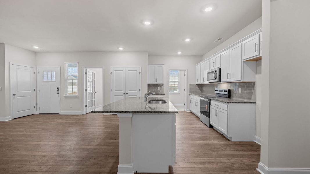 Furnished interior view inside a new home in Tyler - Home on the Lake, New Bern (Image 3).