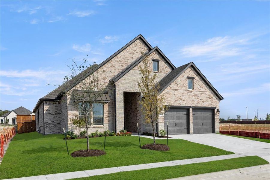 Front exterior of a new home in River Ranch, Van Alstyne, TX, highlighting curb appeal (Image 2). Front exterior of a new home in River Ranch, Van Alstyne, TX, highlighting curb appeal (Image 2).