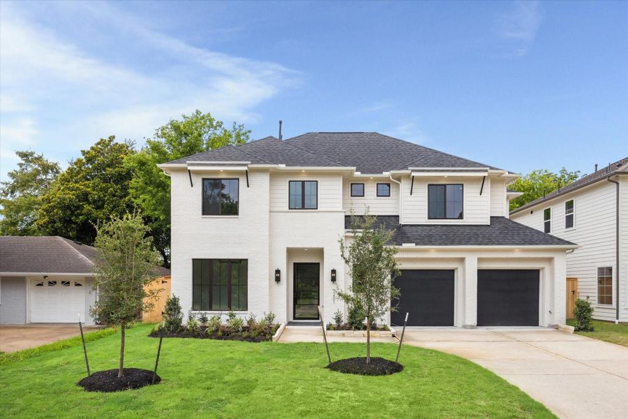 Modern elegance meets timeless curb appeal in this new 4-bedroom, 4.5-bath home on an oversized 8,320 sqft lot in a prime location. This newly constructed home features a crisp white brick and siding exterior, sleek black-framed windows, and custom iron double doors that create a bold first impression. Clean rooflines, matte black accents, and elevated lighting add architectural interest, while a thoughtfully landscaped front yard enhances the curb appeal. Modern elegance meets timeless curb appeal in this new 4-bedroom, 4.5-bath home on an oversized 8,320 sqft lot in a prime location. This newly constructed home features a crisp white brick and siding exterior, sleek black-framed windows, and custom iron double doors that create a bold first impression. Clean rooflines, matte black accents, and elevated lighting add architectural interest, while a thoughtfully landscaped front yard enhances the curb appeal.