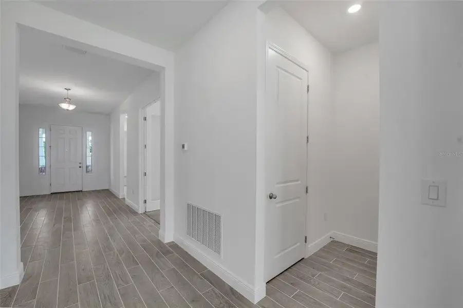 Spacious, unfurnished interior of a new home in Avalon Woods, Winter Garden (Image 38).