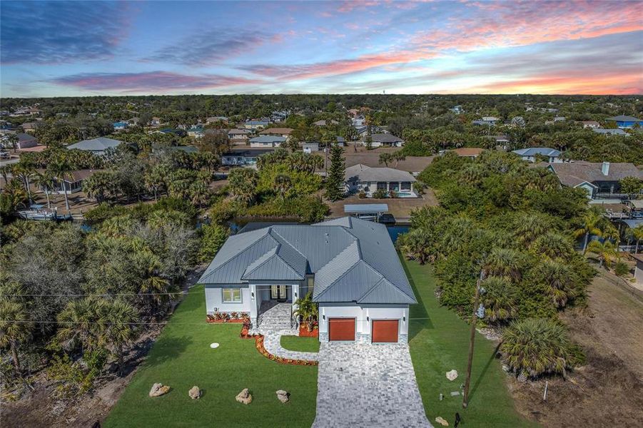 Front exterior of a new home in , Port Charlotte, FL, highlighting curb appeal (Image 27).