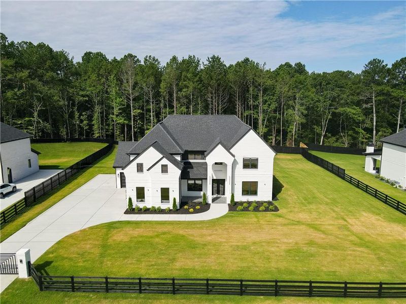 Front exterior of a new home in , Sugar Hill, GA, highlighting curb appeal (Image 6).