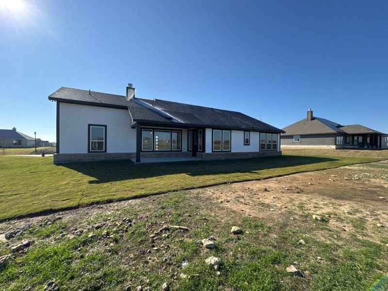 Exterior details and patio area of a home in Fairview Meadows, New Fairview (Image 3).