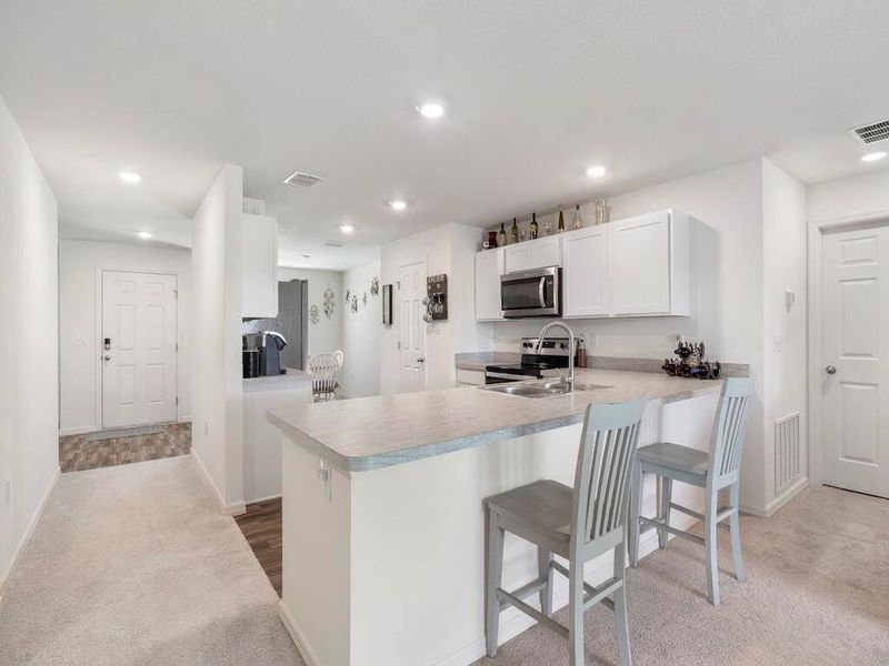 Furnished interior view inside a new home in , Port St. Lucie (Image 8).