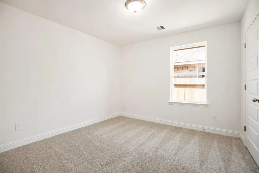 Spacious, unfurnished interior of a new home in Kiber Reserve, Angleton (Image 5). Spacious, unfurnished interior of a new home in Kiber Reserve, Angleton (Image 5).